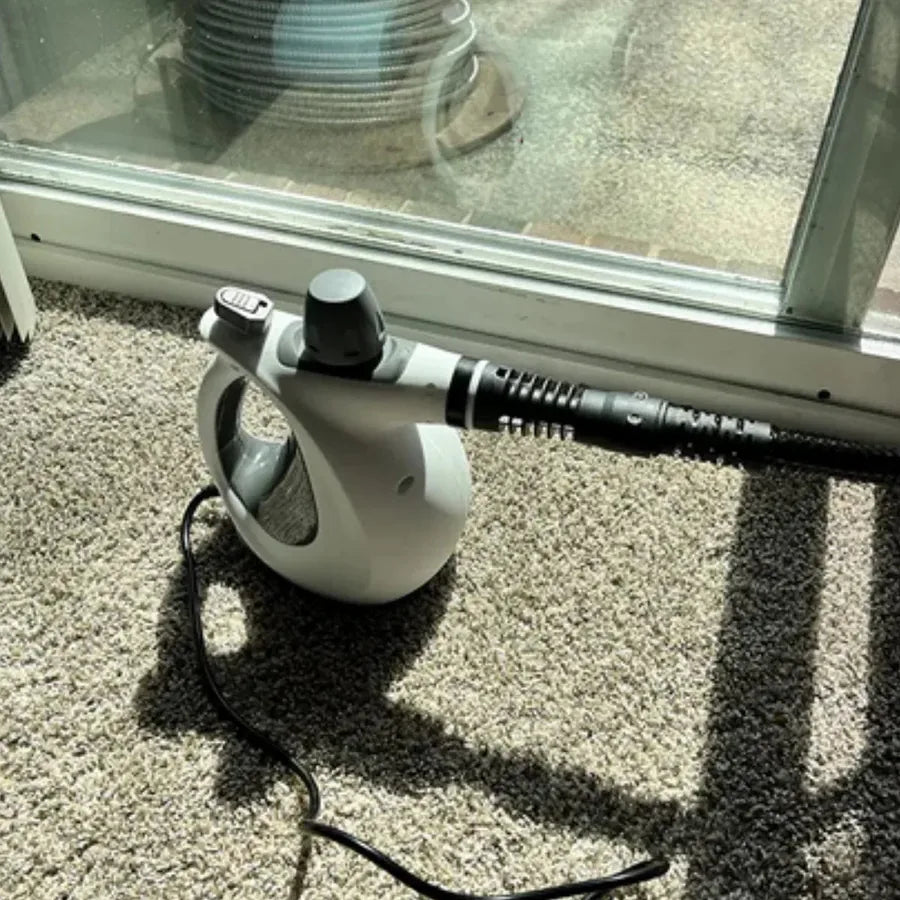 VaporSmart usado perto do trilho da porta de vidro e carpete
